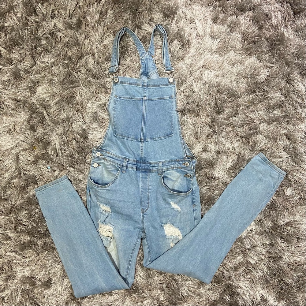 SWS Denim Co women blue denim distressed overall. Size 7. Used.